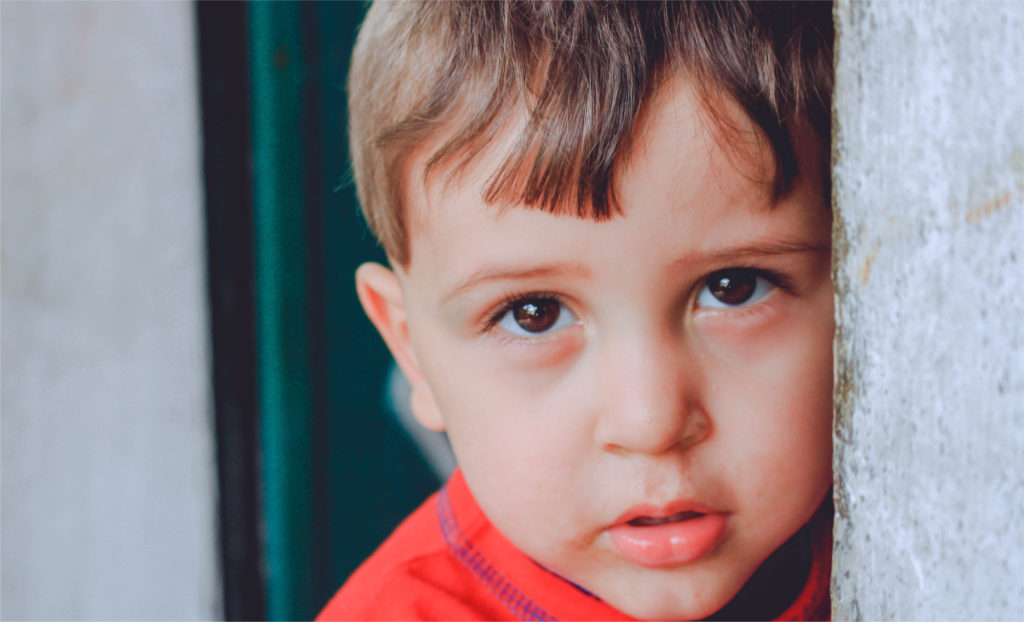 A close up picture of a little boy