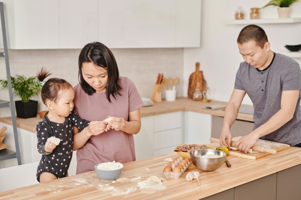 Family cooking with child